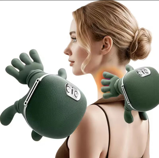 Woman using green massage gloves on her neck and shoulders with a plain background