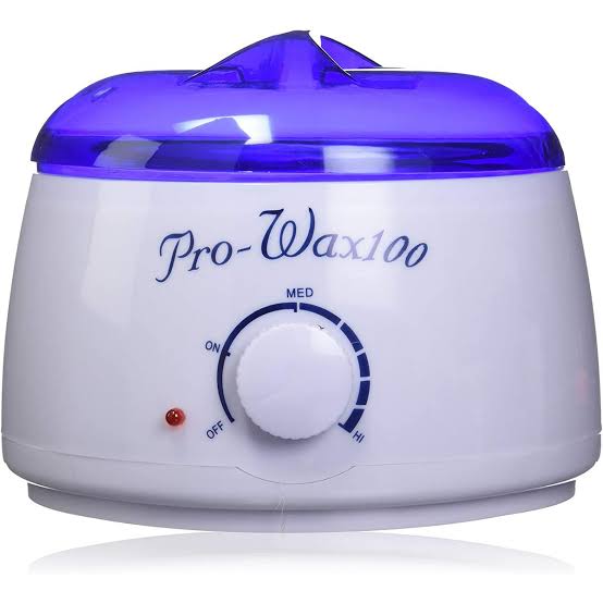 White wax warmer with blue top labeled 'Pro-Wax100' on a white background