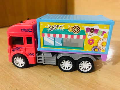 Toy truck with a colorful 'Happy Donut' design on a wooden surface