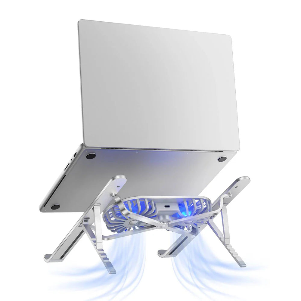 Laptop on a cooling stand with blue LED lights on a white background